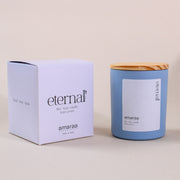 Eternal soy wax candle in blue jar with wooden lid and branded box by amaraa fragrances